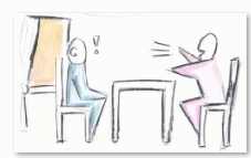 Kommunikation kann man lernen Zwei Personen am Tisch im Gespräch